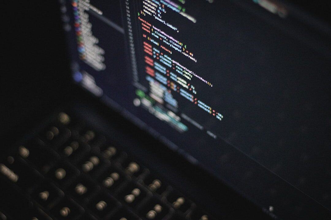 Cybersecurity digital lock and code on dark screen