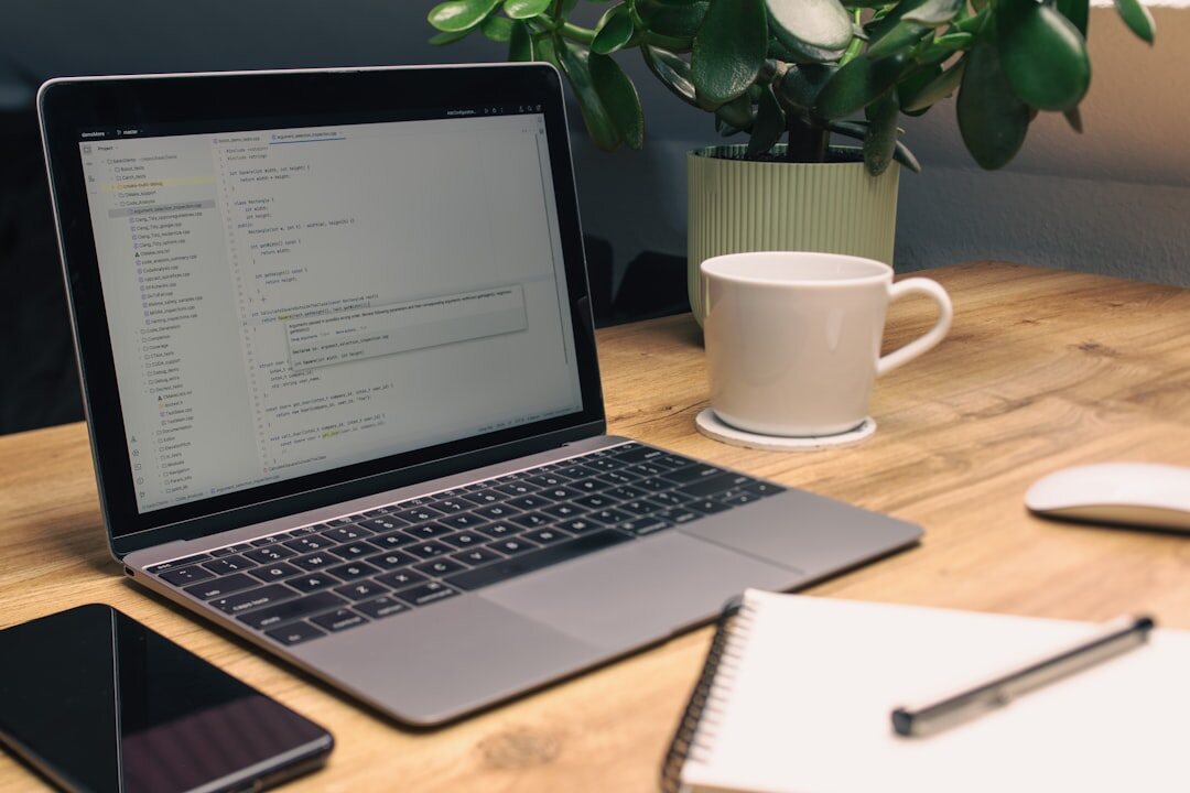 Technology workspace with laptop graphs and digital analysis