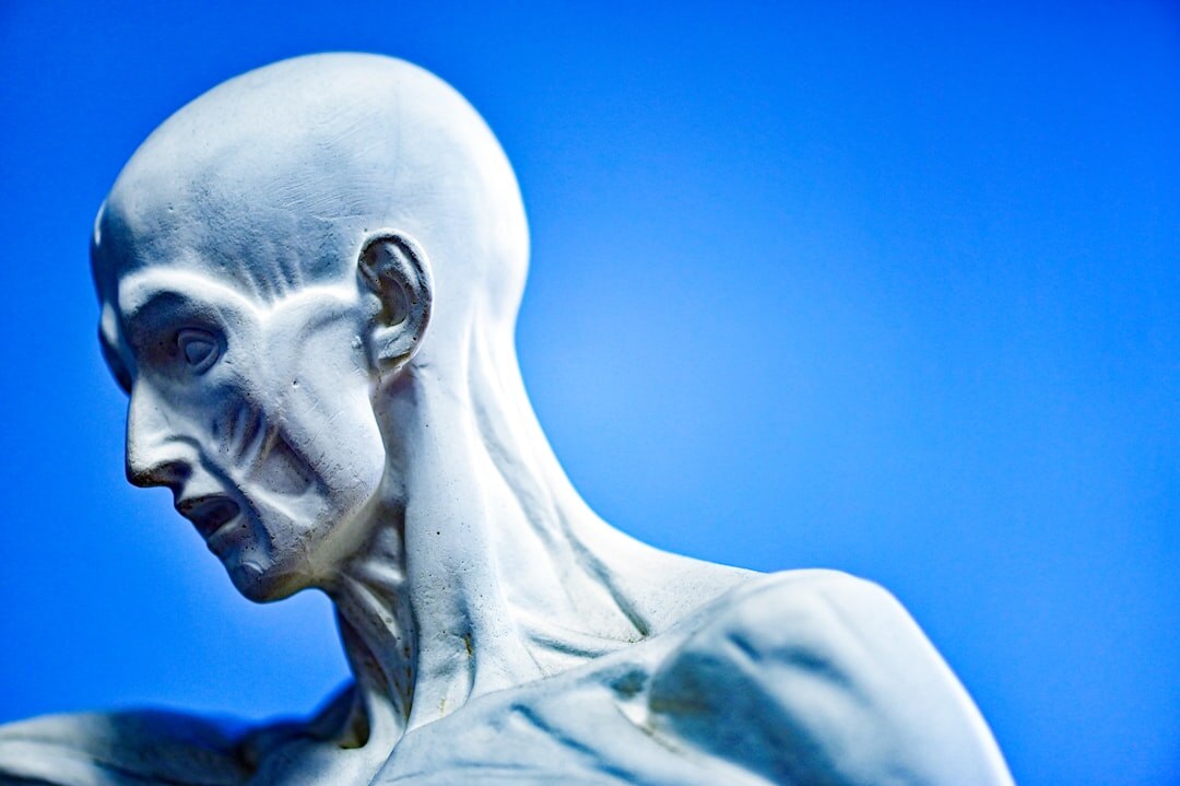 Modern white humanoid AI robot with blue glowing eyes